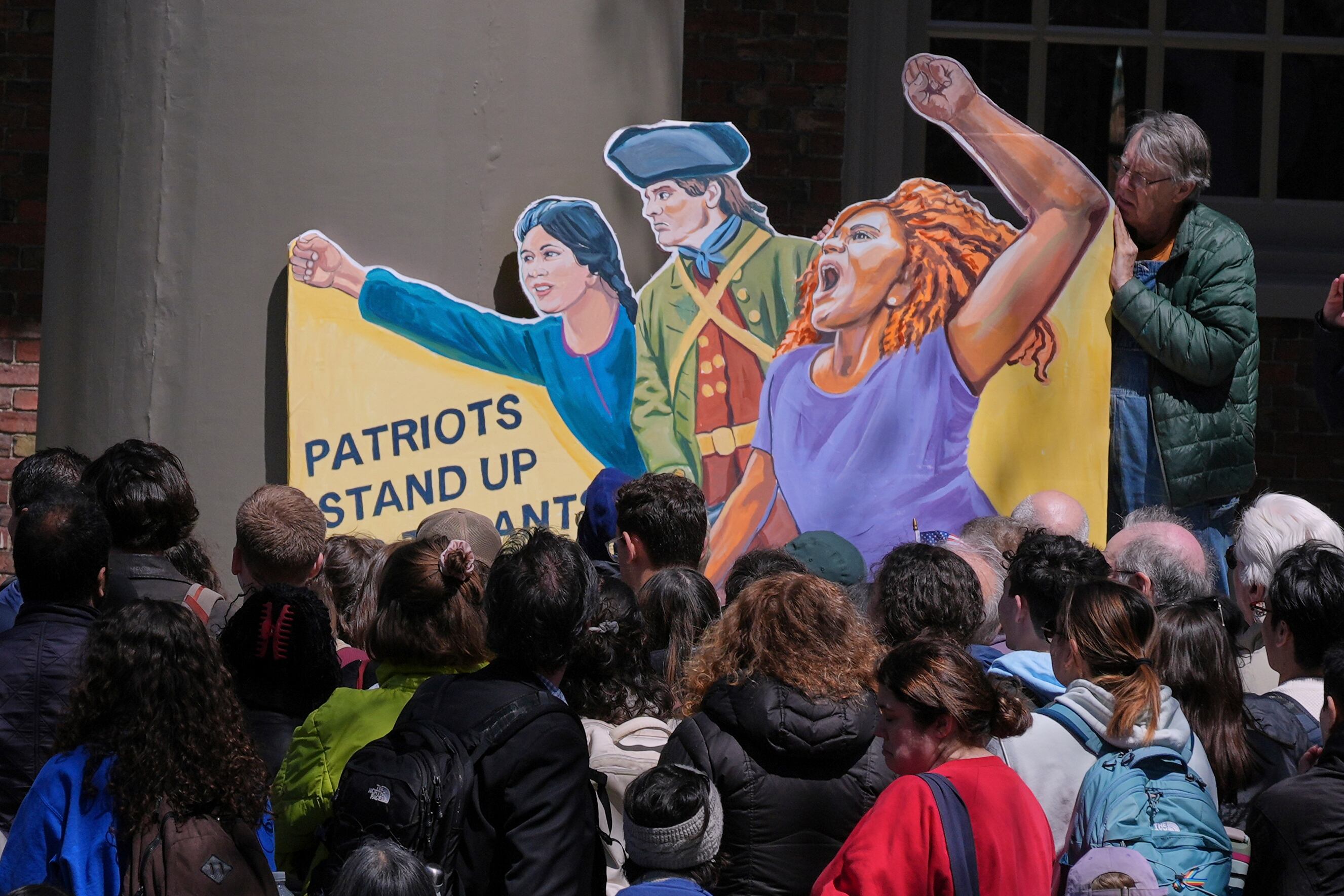 Students, faculty and members of the Harvard University community rally, Thursday, April 17, 2025, in Cambridge, Mass.