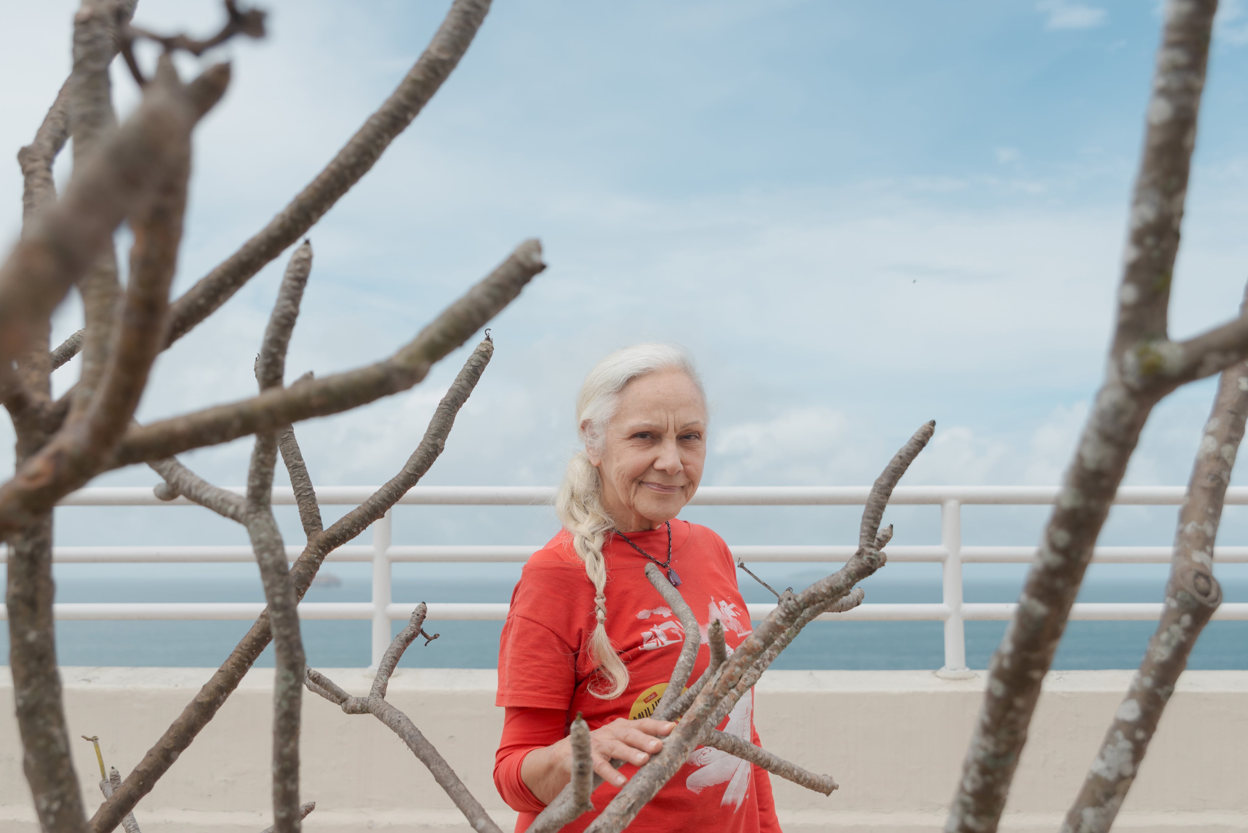 Portrait of Ângela Valério on the rooftop terrace of her building in Copacabana, Rio de Janeiro, Brazil.