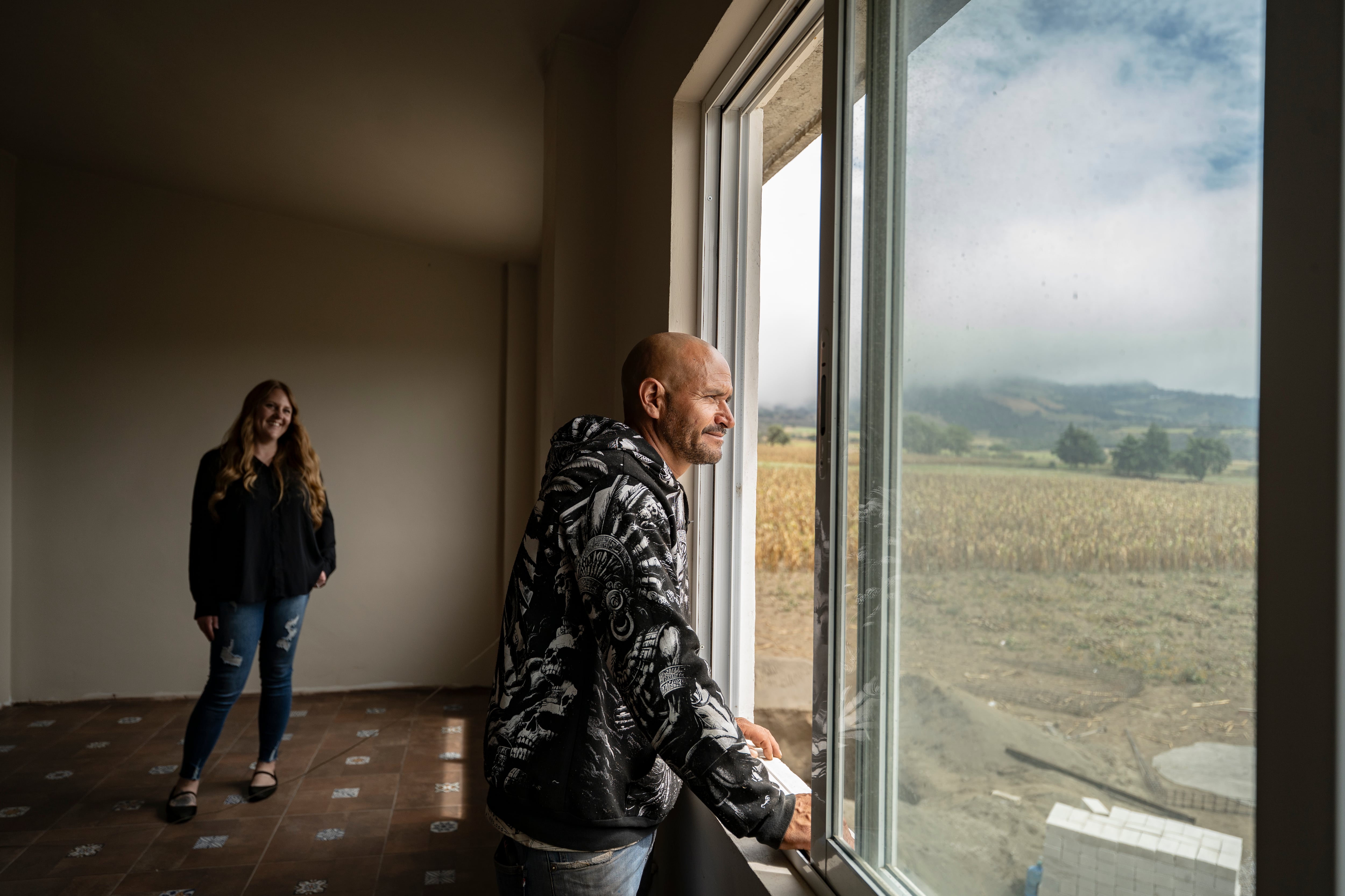 Candice Marie García Sánchez and Fidel García Sánchez tour their house.