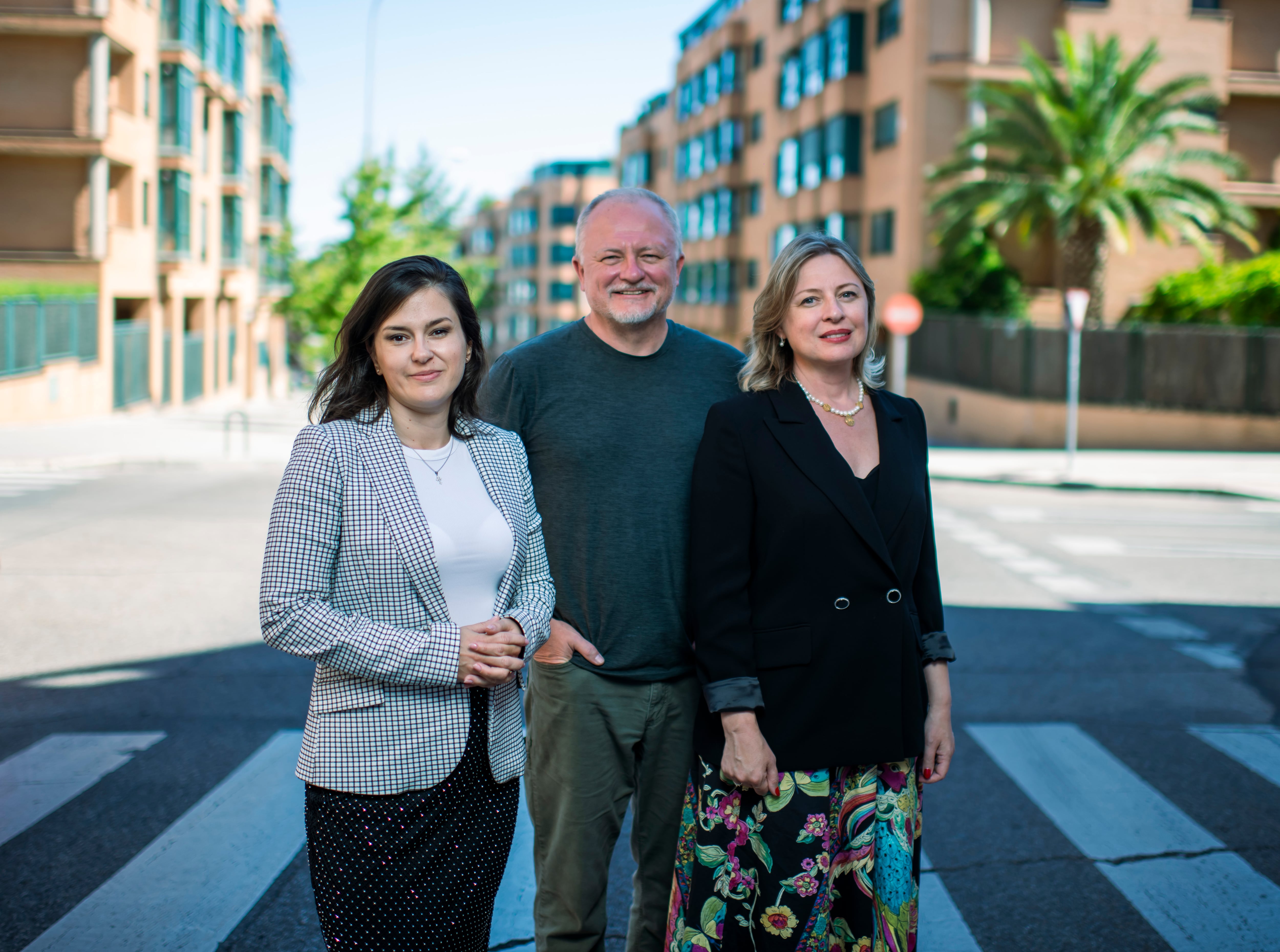 Kyrystyna Shchubelka, left, with Taras and Olga Oleksyk, in Madrid.