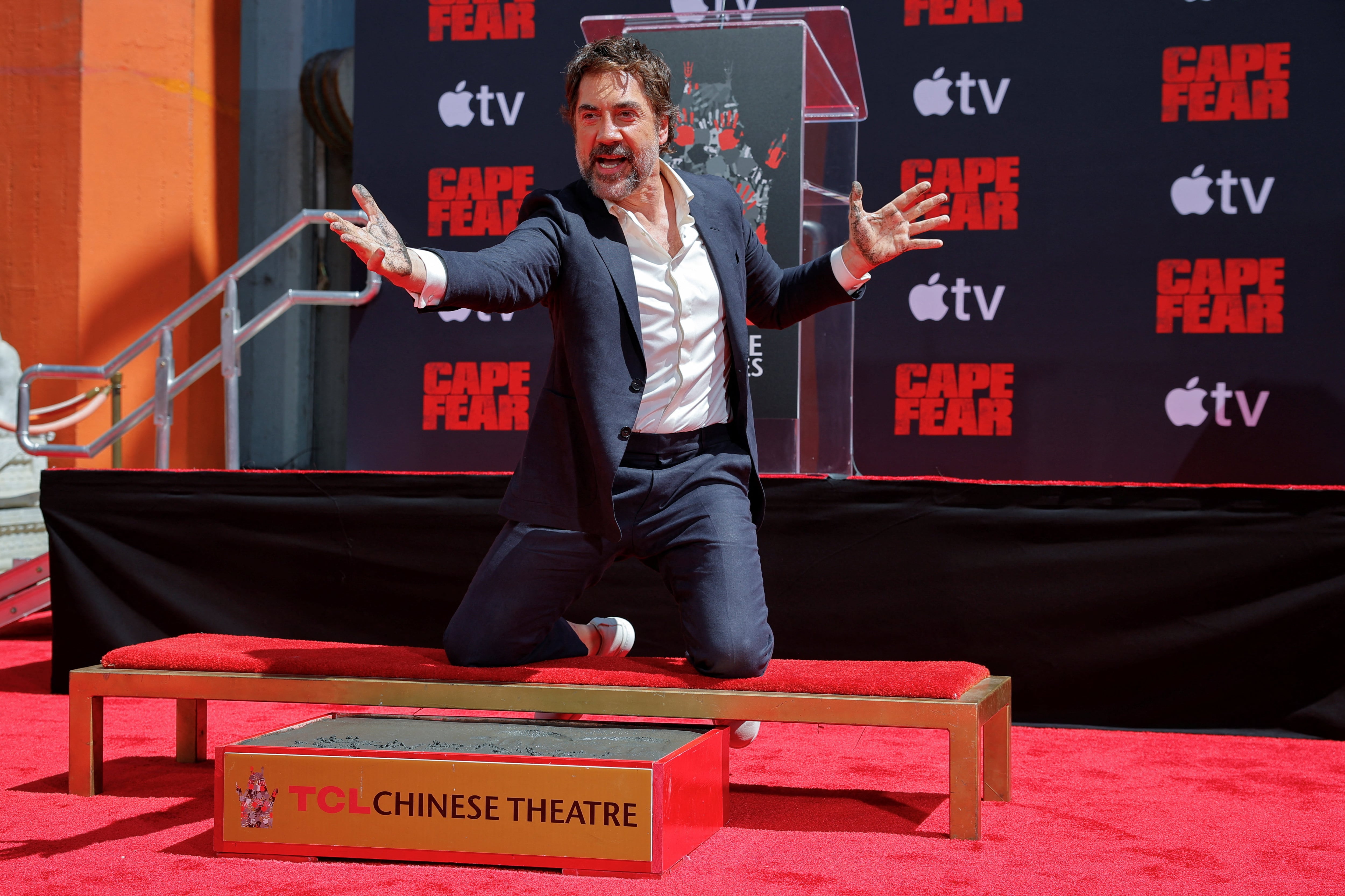 Actor Javier Bardem reacts as he poses during his hand and footprint ceremony at TCL Chinese Theatre in Los Angeles, California, U.S., June 16, 2026. REUTERS/Mike Blake TPX IMAGES OF THE DAYAcademy Award winner Javier Bardem to be honored with hand and footprint ceremony at TCL Chinese Theatre