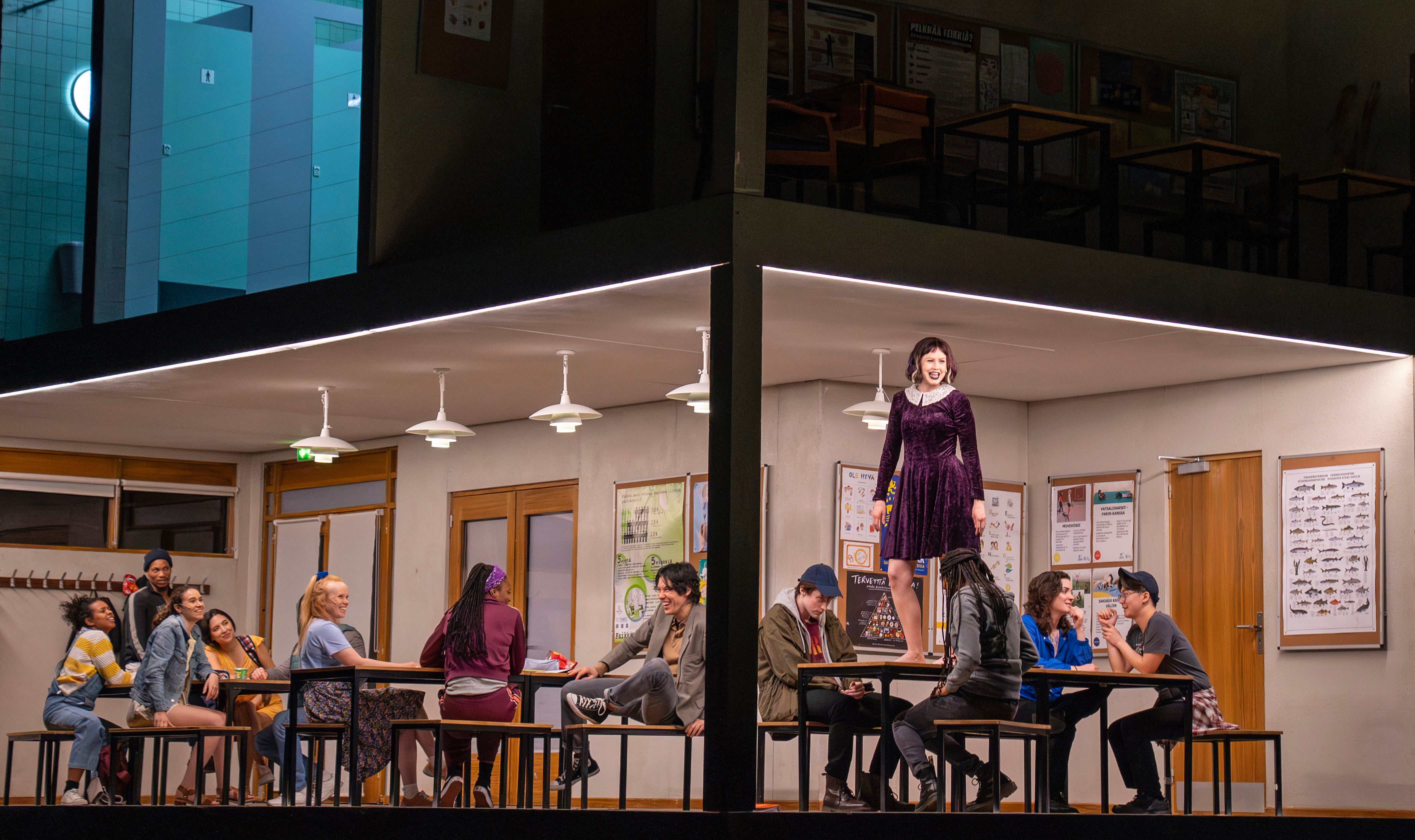 Vilma Jää, standing on the table, in one of the scenes set at the high school where the massacre takes place in 'Innocence.'