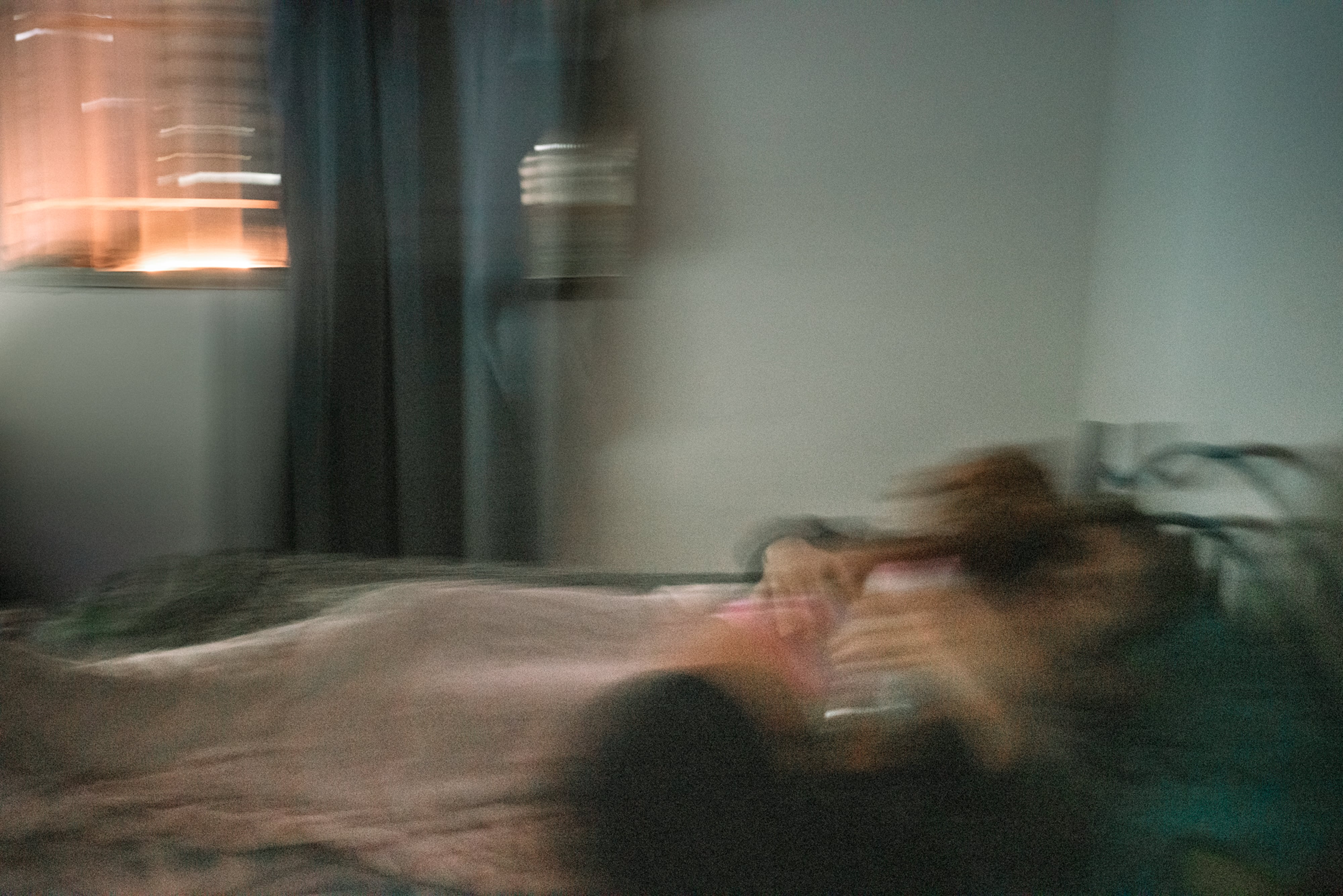 A companion embraces a woman undergoing an abortion in a low-income neighborhood of Caracas, Venezuela, on August 26, 2022. The procedure lasted about four hours. As she moaned in pain inside the bathroom, the companion held her and said, “You are strong, you can get through this. I'm right here.”