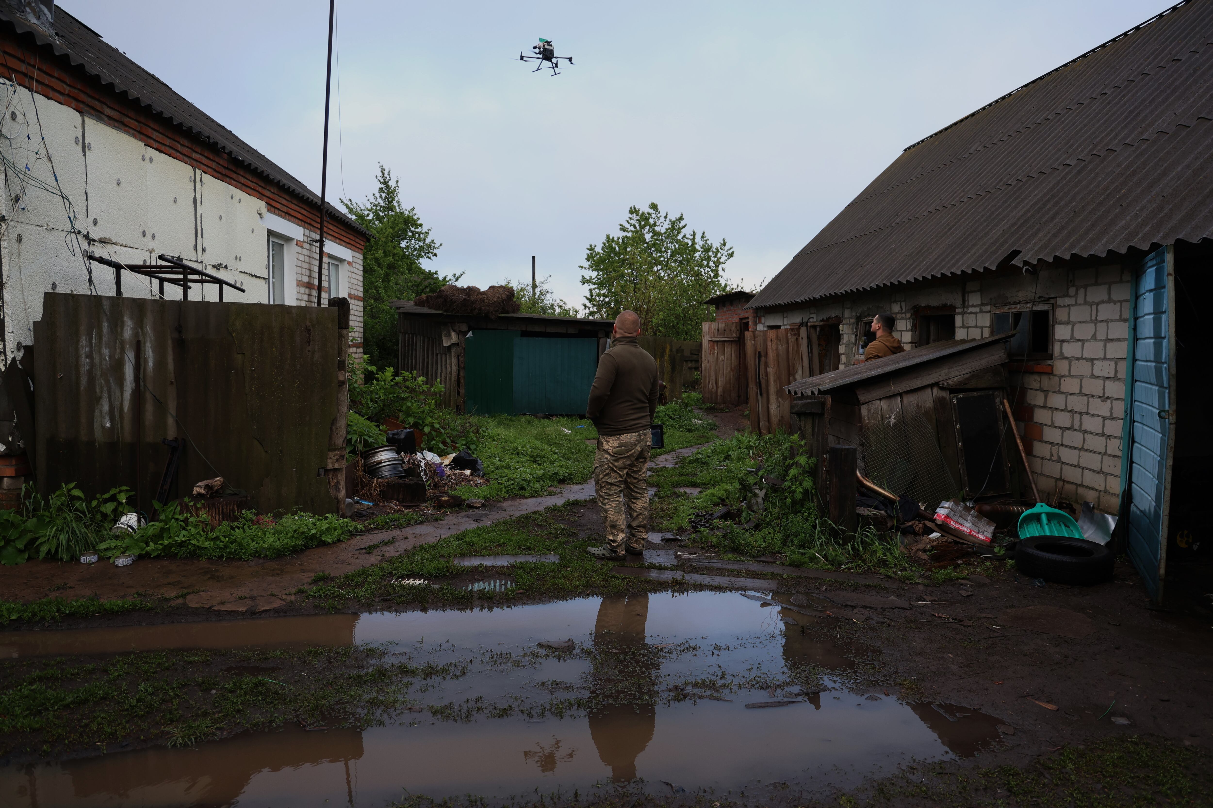 Members of the Achilles drone unit with an unmanned aircraft on the Kharkiv front on May 13.