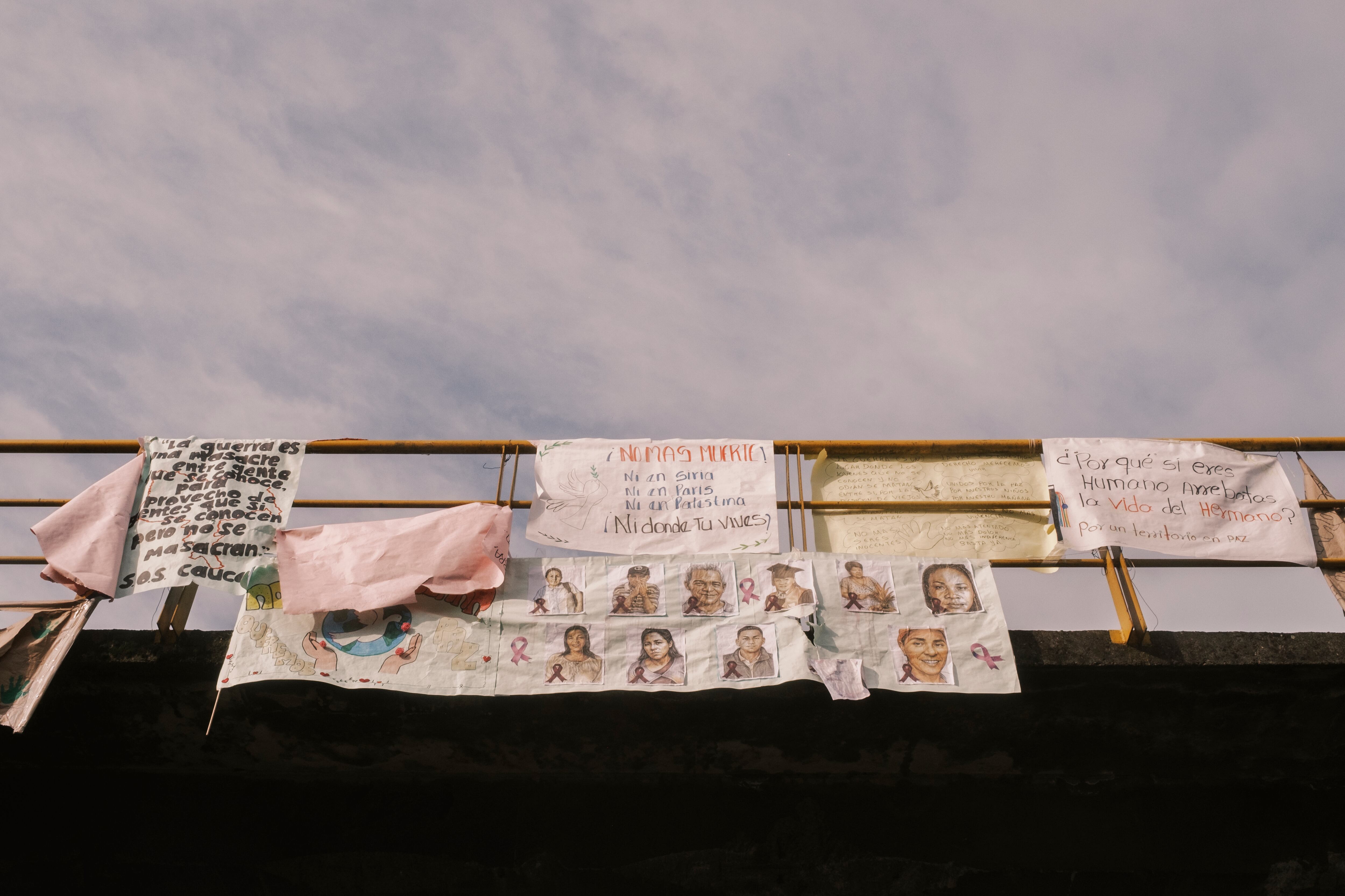 Banners and signs honoring the victims of a bomb attack on April 25, in which 22 people died.