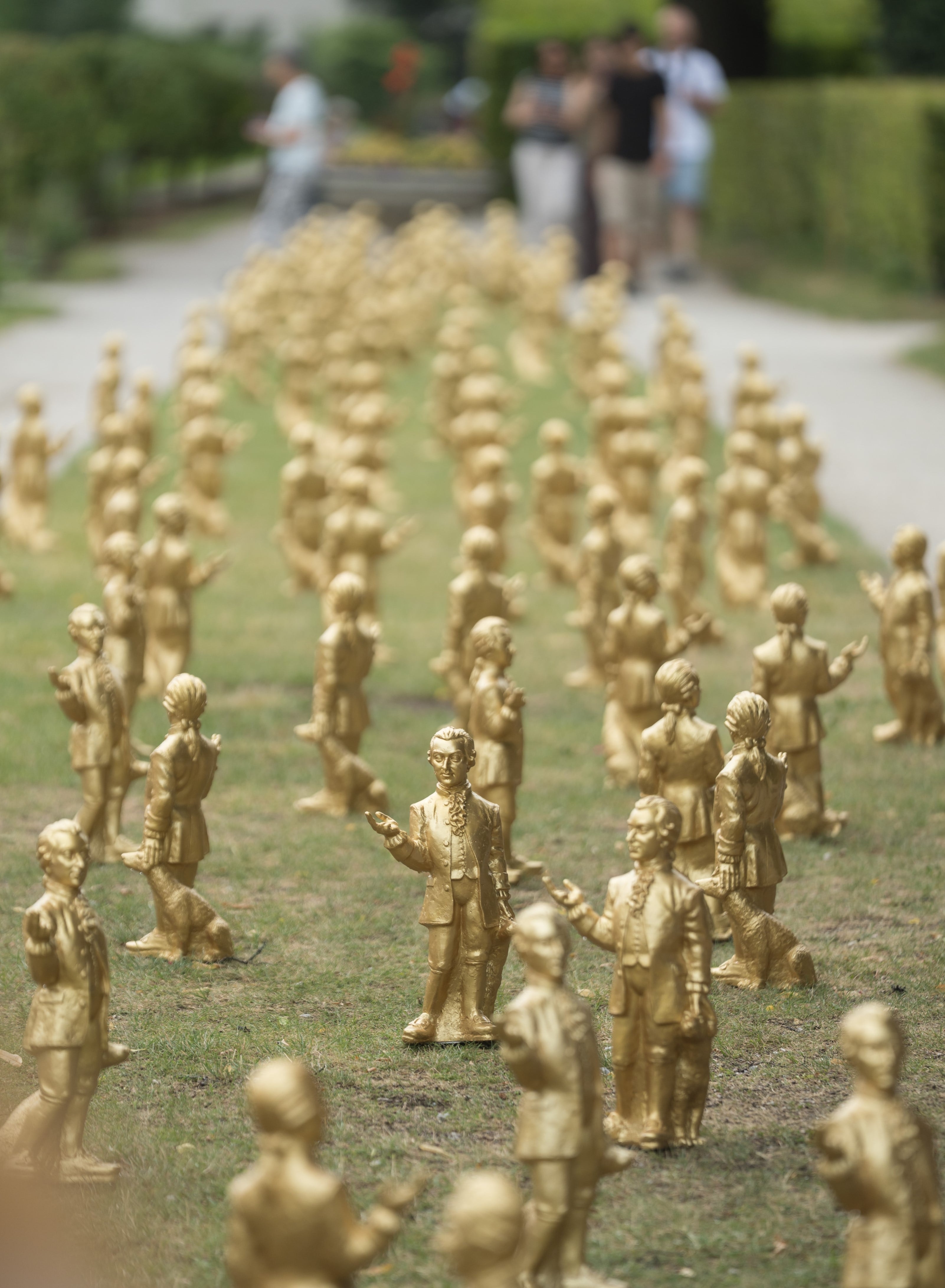Installation of the half-meter-tall Mozart figurines by German artist Ottmar Hörl in the gardens of Mirabell Palace (Salzburg).