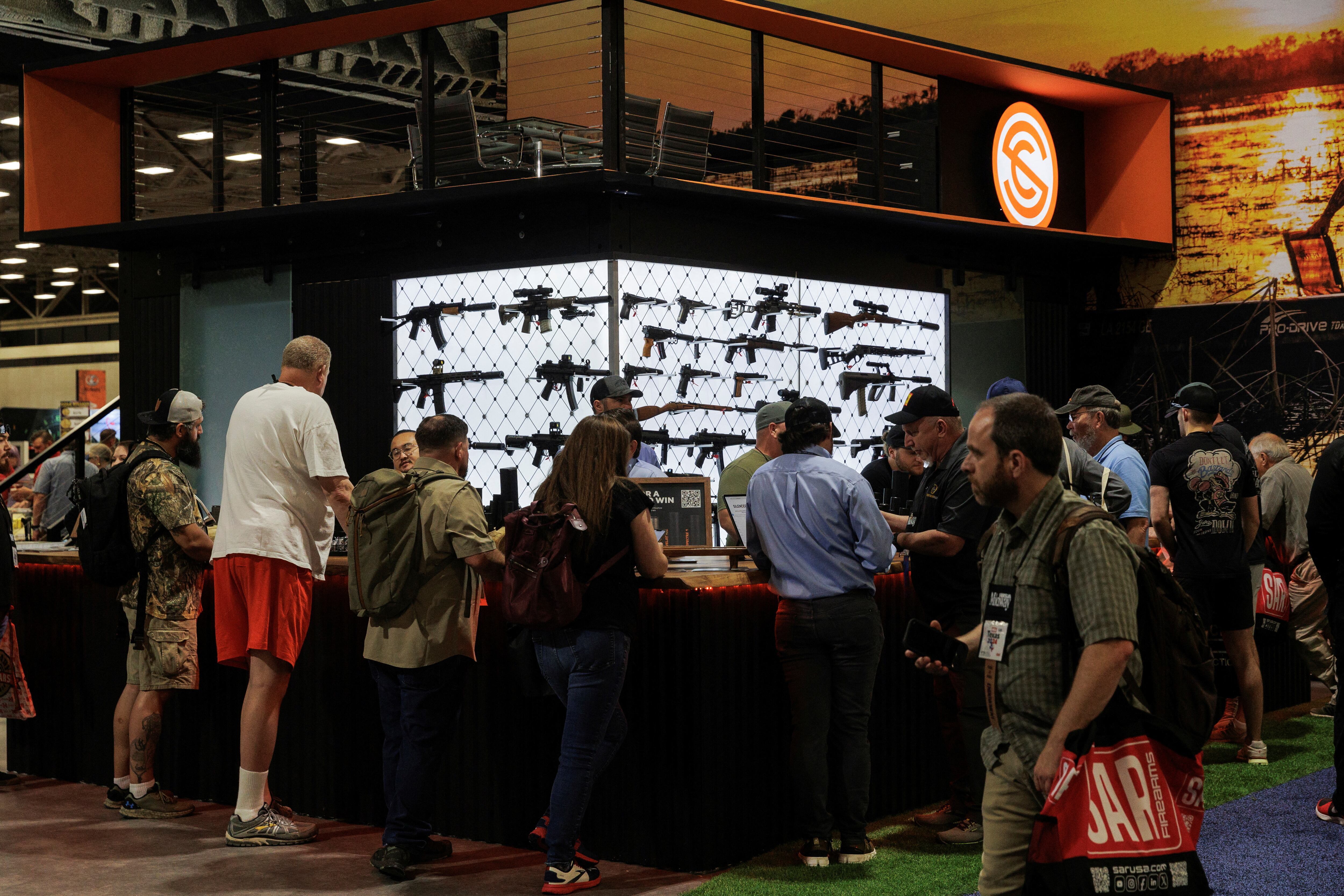 Customers at the annual National Rifle Association (NRA) expo in Dallas on May 17.