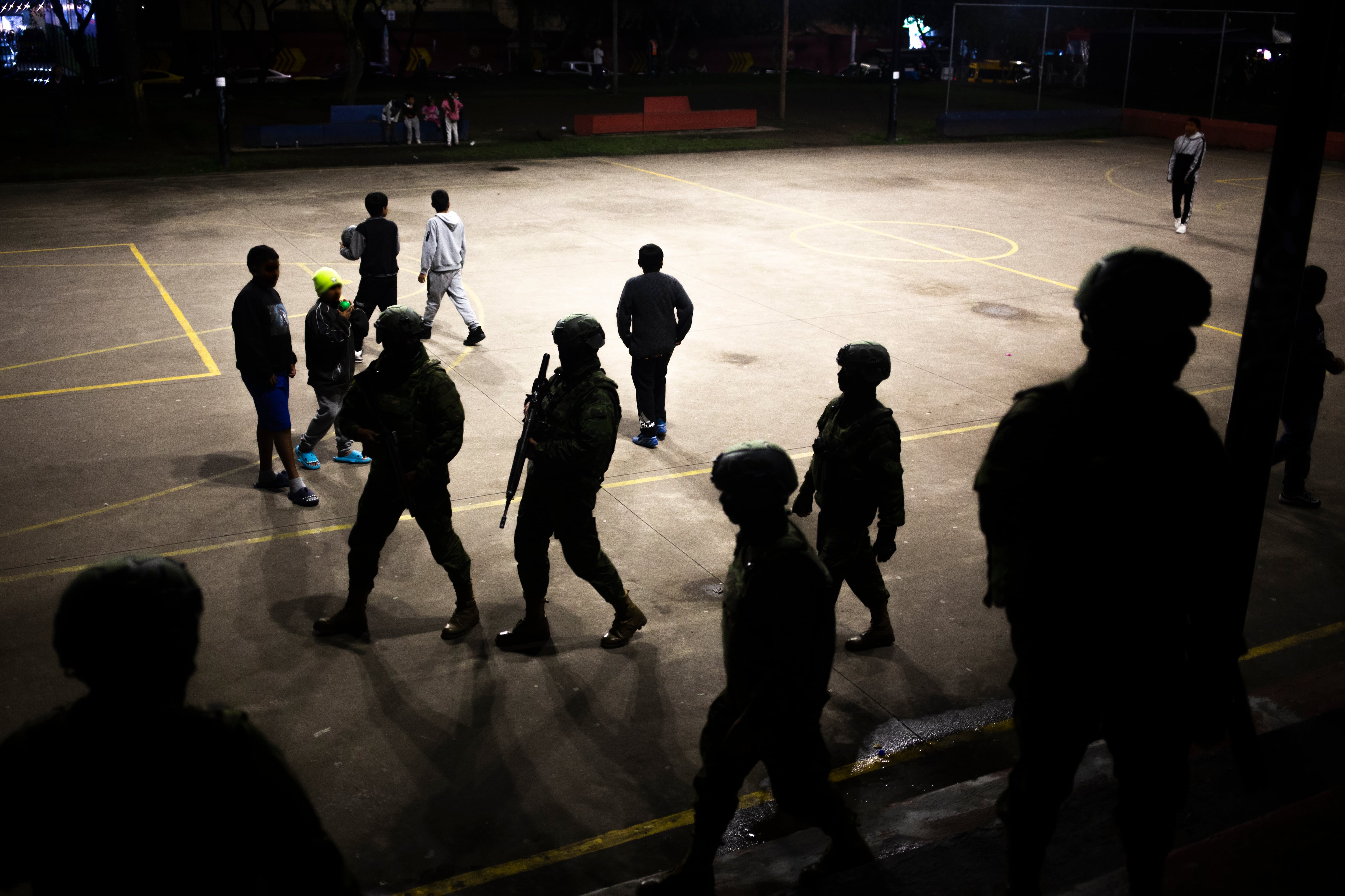 Soldiers patrol the streets of the Solanda neighborhood, south of Quito.