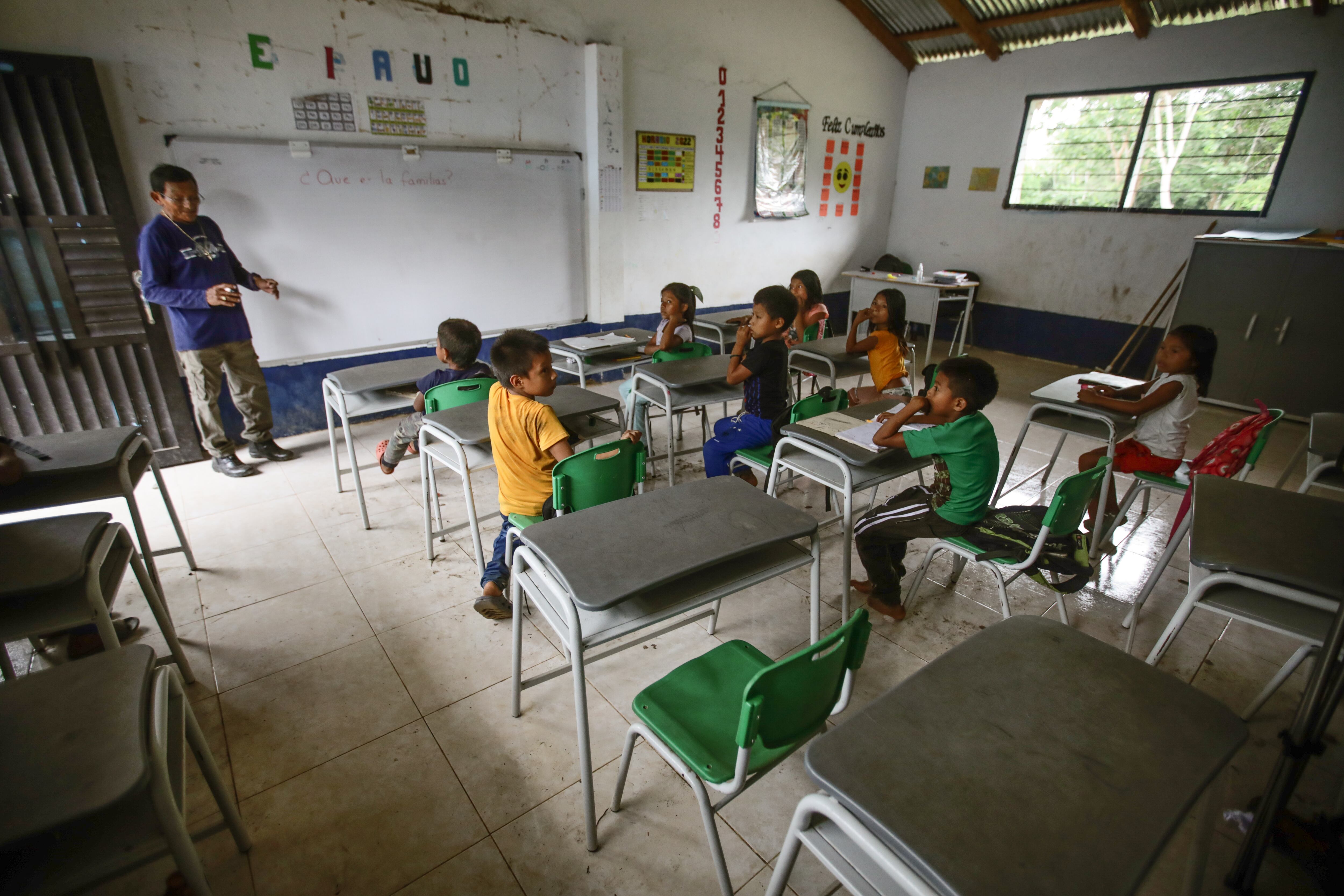 A teacher and his group of students in Unguia, Colombia, on May 4, 2022. 