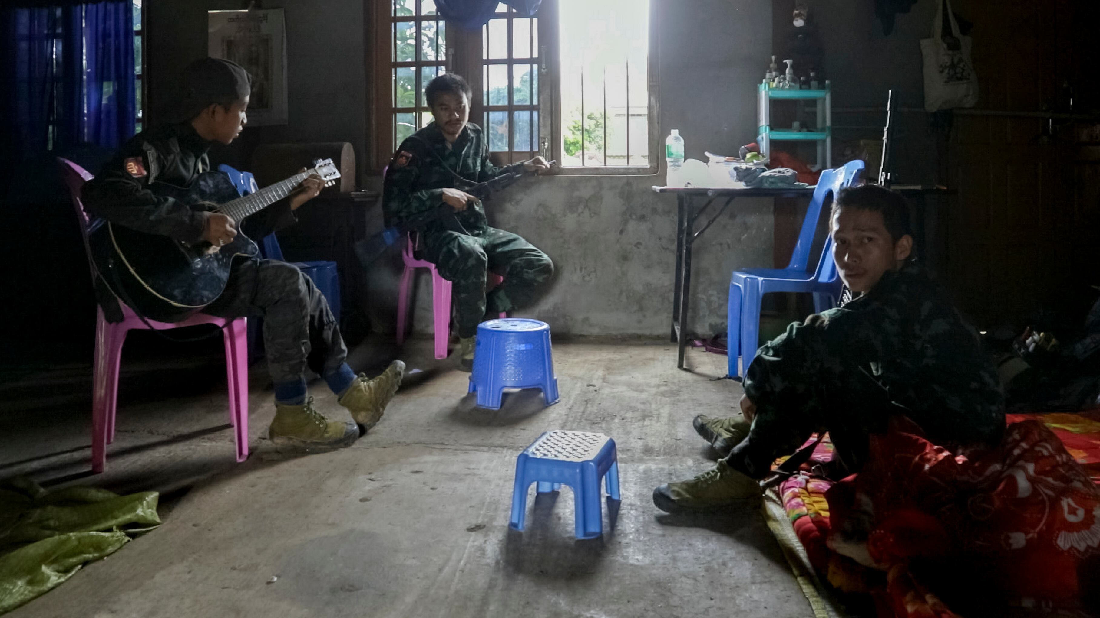 Young Karenni soliders rest at a secret base in Loikaw, on the frontlines of the war.