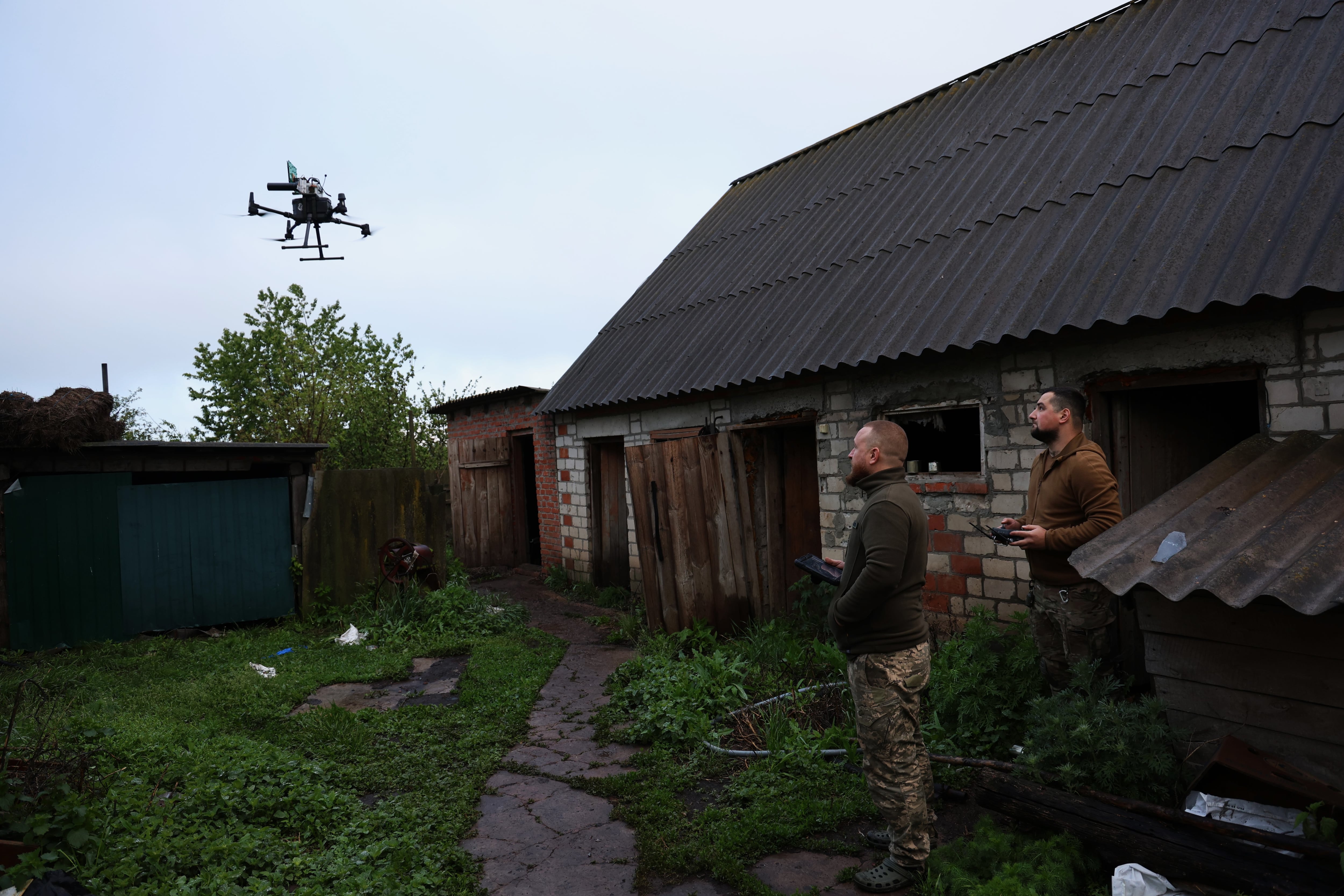 Inside a camouflaged drone workshop, a step away from the front lines in Ukraine