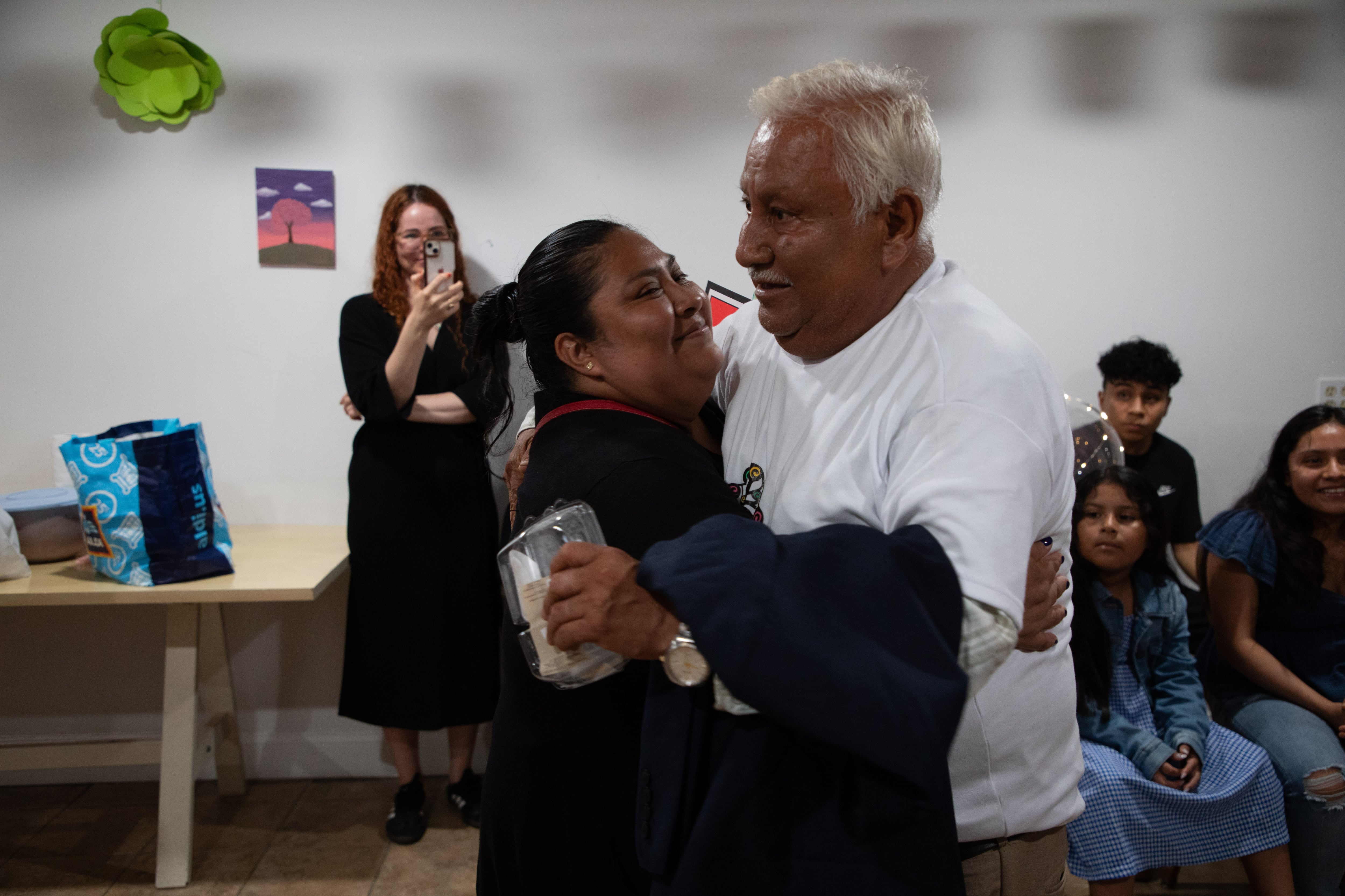 After 20 years of being separated by migration, a difficult first embrace in New York City