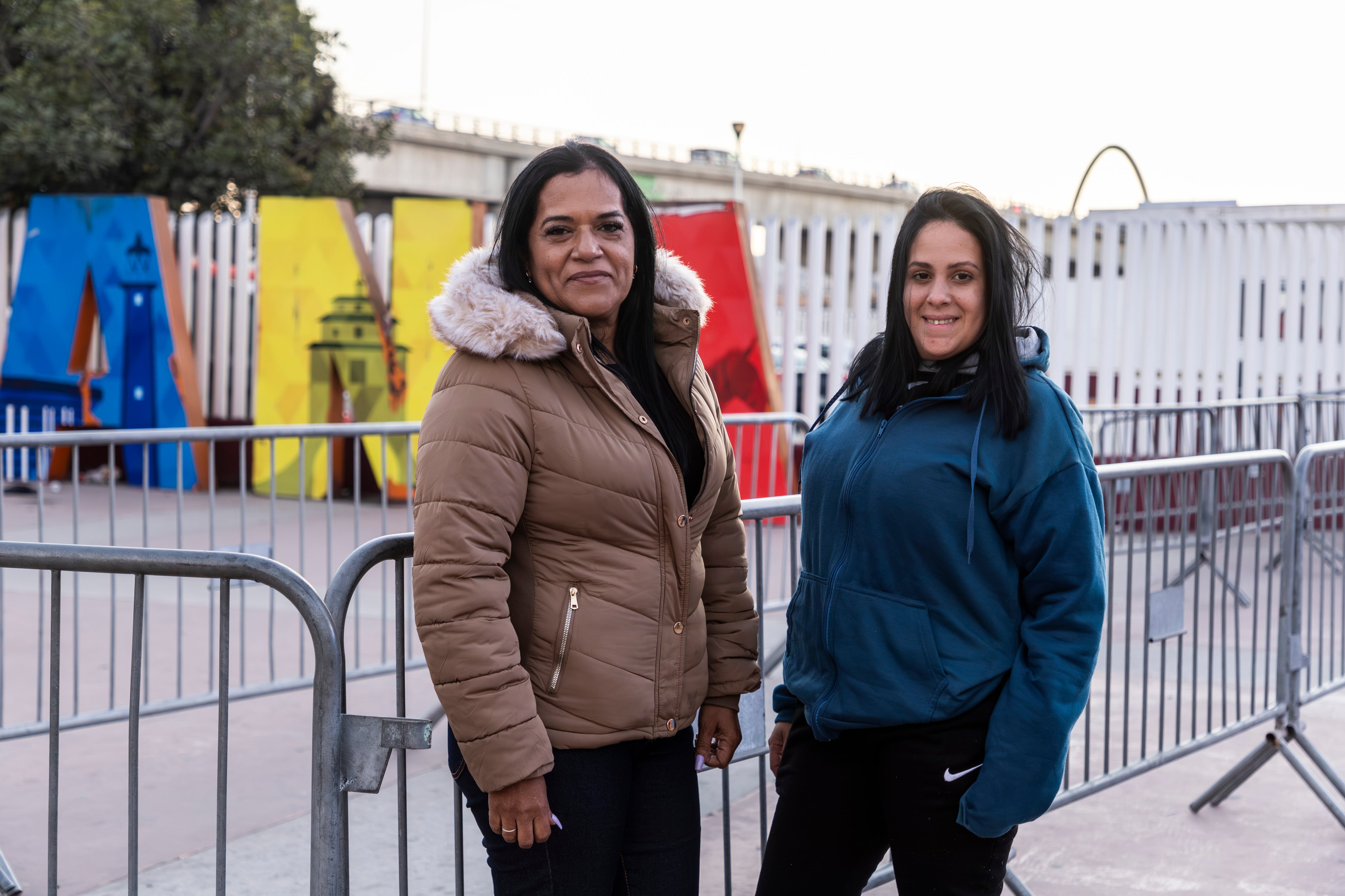 Belkis and Dayana from Venezuela await a response from the CBP On appointment system at the El Chaparral border crossing in Tijuana, Baja California.