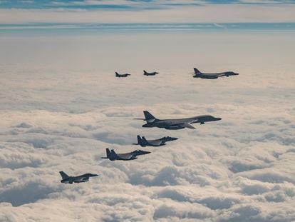 U.S. Air Force B-1B bombers, F-16 fighter jets, South Korean and Japanese fighter jets fly over South Korea's island of Jeju during a joint air drill, Wednesday, Dec. 20, 2023.