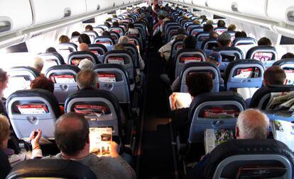 Passengers inside an Airbus plane.