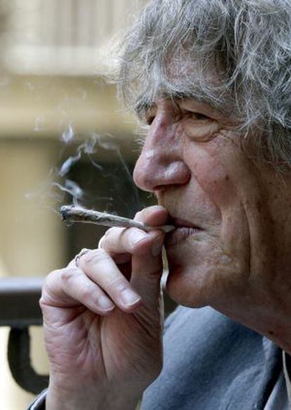 Howard Marks, known as Mr Nice, puffs on a joint.