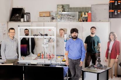 Part of the team working on the IntelliMan project in Bologna. On the right is researcher Alessandra Bernardini, who is working on the sensors that will provide the robots with a sense of touch. Third from right is assistant professor Roberto Meattini. 