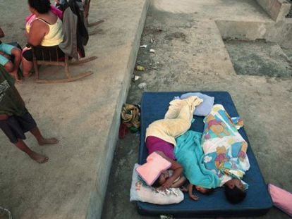People in Managua sleep outdoors, in accordance with the government's request.