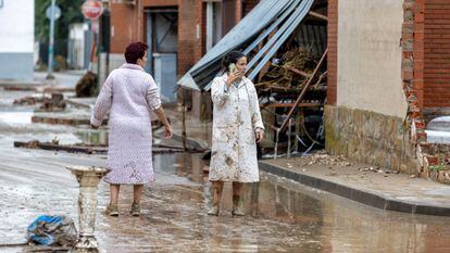 Two women outside their homes in Villaluenga de la Sagra, in Toledo province. 