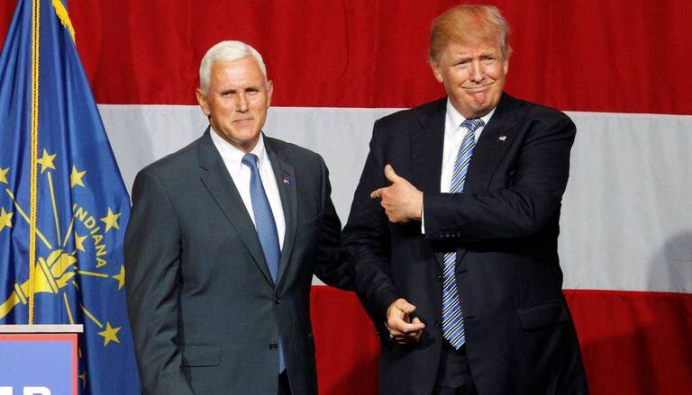 Donald Trump and Indiana Governor Mike Pence address the crowd on June 12.