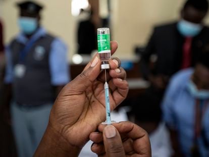 A nurse prepares a Covid-19 vaccine in Nairobi.