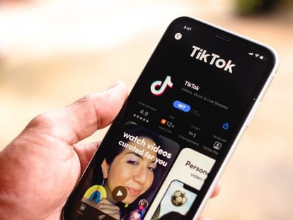 In this photo illustration the TikTok logo in App Store seen displayed on a smartphone screen.