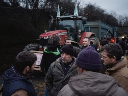 French farmers block the A6 motorway in Chilly-Mazarin, about 12 miles south of Paris, last Thursday.