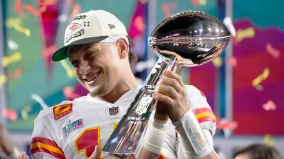Kansas City Chiefs quarterback Patrick Mahomes (15) holds the trophy after their win against the Philadelphia Eagles in the NFL Super Bowl LVII.