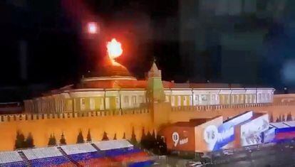 A flying object explodes near the dome of the Kremlin Senate building in Moscow, Russia, in this image taken from video obtained by Reuters on May 3, 2023. 