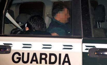 A suspect arrested in Operation Taula on Tuesday arrives at the courthouse.