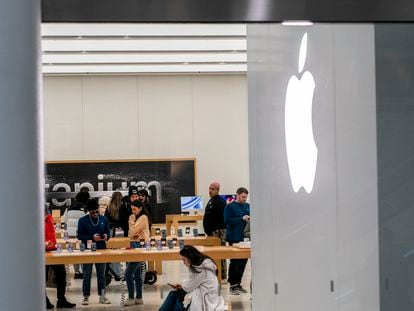 Customers in one of the Apple brand's stores in New York.