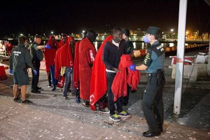 Migrants arriving at the port of Motril.