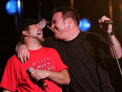Steve Harwell, right, sings with Joey Fatone, of the band 'N Sync, at a Disney event in 2005.