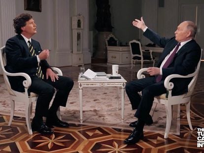 Host Tucker Carlson and Vladimir Putin, president of Russia, during the interview broadcast Thursday.