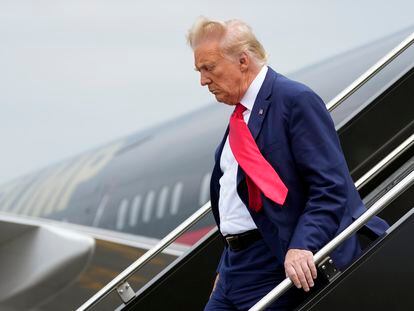 Former President Donald Trump arrives at Ronald Reagan Washington National Airport, on August 3, 2023, in Arlington, Virginia.