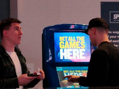 People make bets at the sportsbook at the Ocean Casino Resort, on Thursday, Feb. 10, 2022, in Atlantic City, N.J.