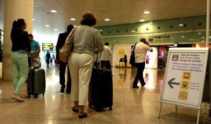 Passengers at Barcelona's El Prat airport.