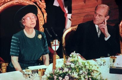 Queen Elizabeth II at a banquet to observe the 40th anniversary of her accession to the throne. Above, pictured with her husband Philip, Duke  of Edinburgh.