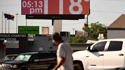 A billboard displays a temperature of 118 degrees Fahrenheit during a record heat wave in Phoenix, Arizona on July 18, 2023.