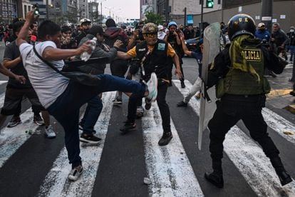 Supporters of Pedro Castillo clash with the police, on December 9.