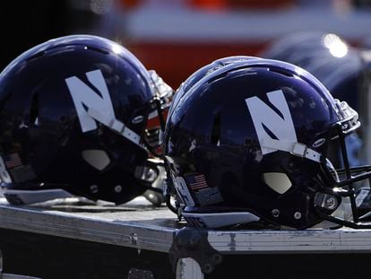 Northwestern helmets are shown during an NCAA college football game against Iowa in Evanston, Ill., Saturday, Oct. 17, 2015.