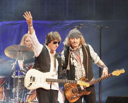 Johnny Depp (r) on stage at a Jeff Beck concert in London.