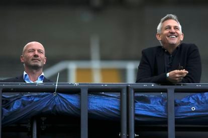 TV soccer pundits and former soccer players Alan Shearer, left, and Gary Lineker watch the FA Cup sixth round soccer match between Newcastle United and Manchester City at St. James' Park in Newcastle, in June 2020.