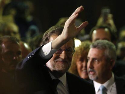 Mariano Rajoy greets supporters after being voted in the new prime minister of Spain.