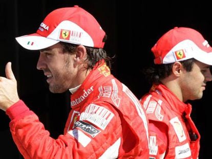Fernando Alonso (l) is staying at Ferrari next year, while Felipe Massa is on the way out.