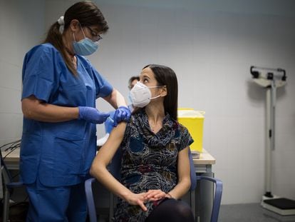 A Covid-19 vaccine is administered in Barcelona on January 28.