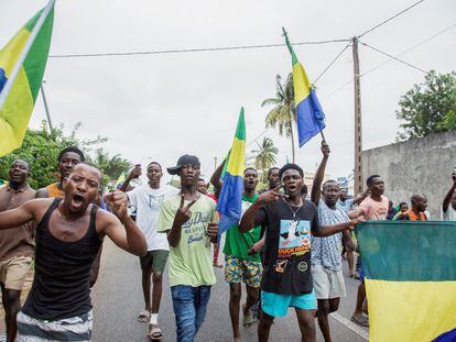 People celebrate in support in a street of Port-Gentil, Gabon, on August 30, 2023.