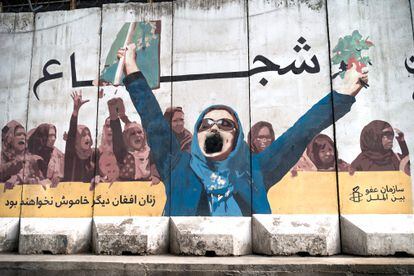 A mural reading "Afghans will not be silent again" on a street in Kabul on Tuesday, January 10, 2023.
