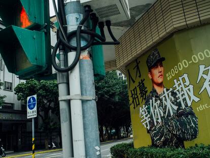 A mural urging young people to enlist in the Armed Forces of Taiwan, on a street in Taipei.