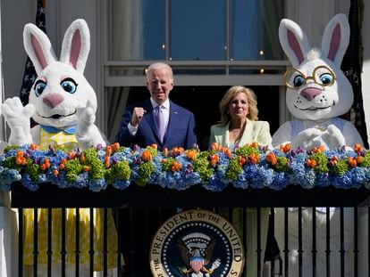 President Joe Biden and first lady Jill Biden stand on the Blue Room Balcony as they participate in the 2023 White House Easter Egg Roll, on April 10, 2023, in Washington.